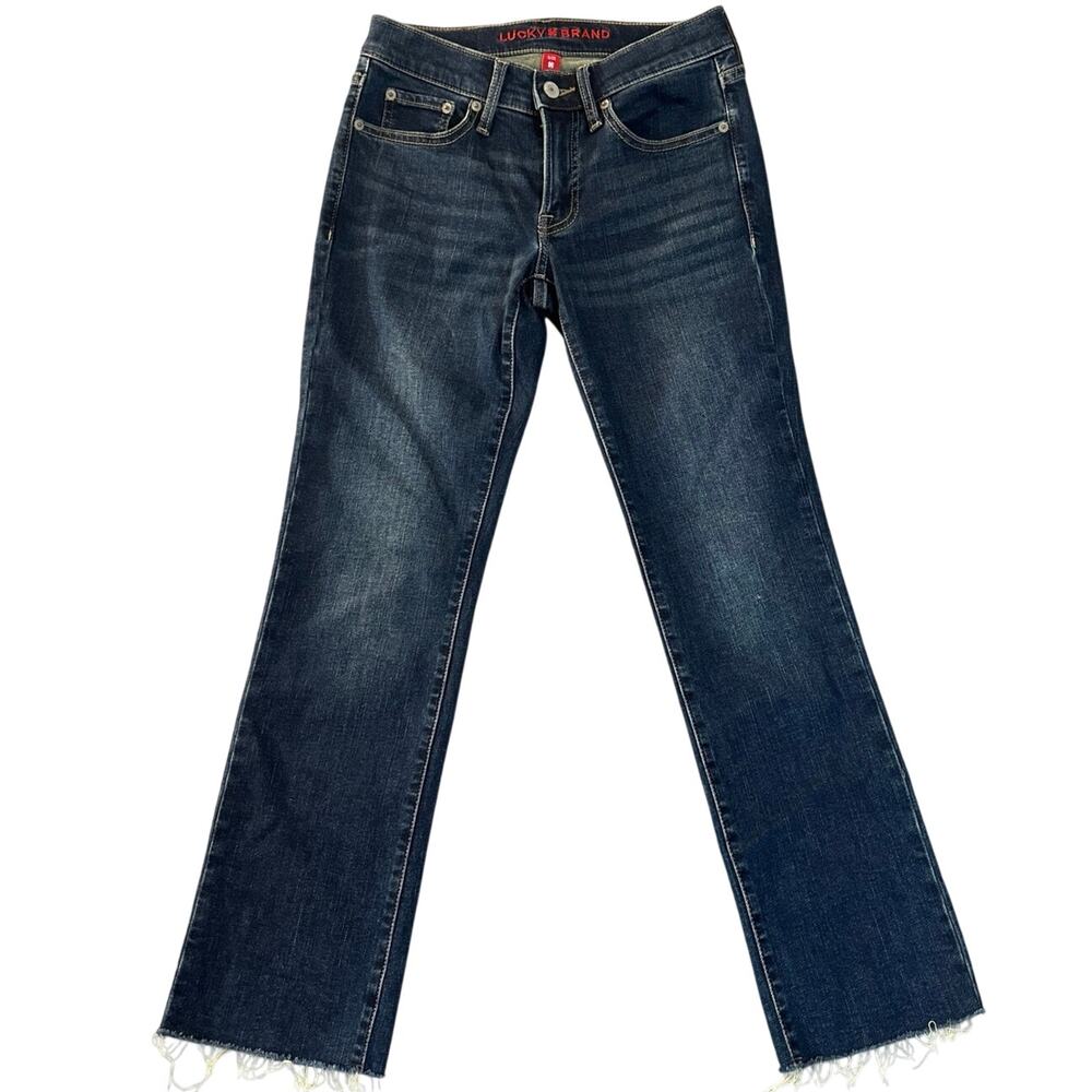 Lucky Brand Denim Jeans in dark denim w/frayed hem. 25” waist with 27” inseem